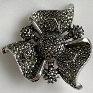 Vogue Silver-Tone swirls of ribbons Marcasite Brooch